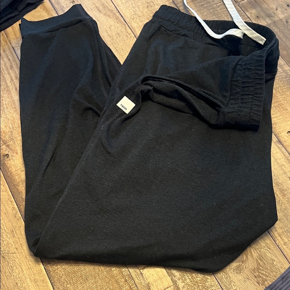 Vuori Black Jogger Pants I’m 5’4 my ankles show. Small hole below knee
